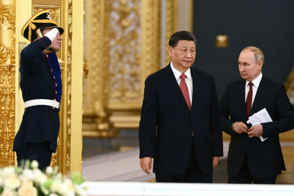China military parade Putin Kim Xi new weapons show of strength